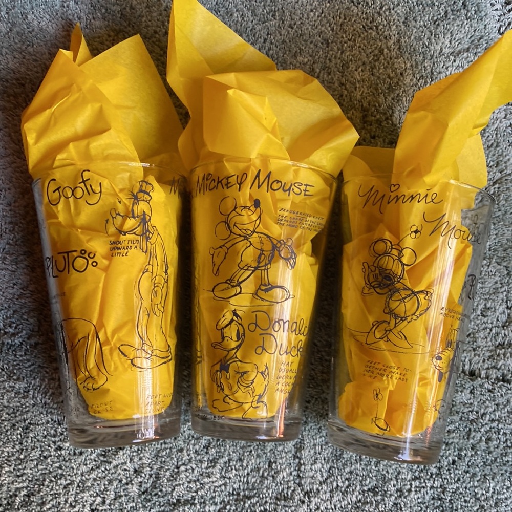 Three Disney drinking glasses